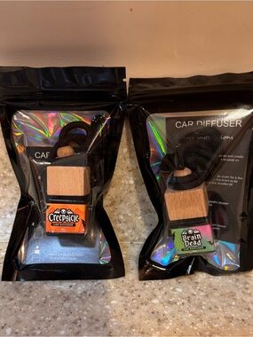 Two Twisted Allure Car Diffusers Creepsicle & Brain Dead. New in package.